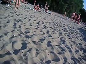 This beach has so many girls with naked boobs and asses
