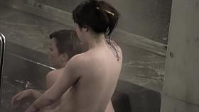 One Asian doll massaging shoulders on another cutie nri061 00