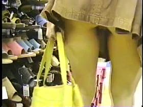 Upskirt at shoestore