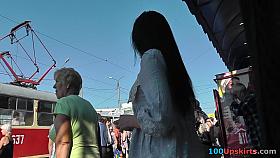 Petite brunette peach presents adorable upskirt view