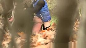 A boy with a girl having sex on a public place