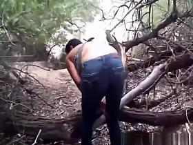 Tattooed brunette exposed thong