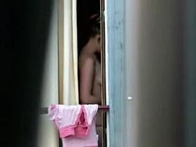 Germain tourist dressing up in hotel room in Paris