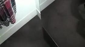 Exhibitionist Woman Gives Blowjob in Dressing Room at Mall