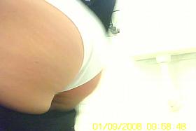 Amateur with sexy trim gets spied pissing in the toilet