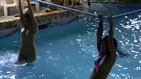 Nude lasses swimming in the pool