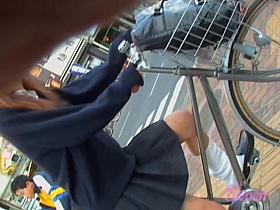 Asian girl got skirt sharked on her bicycle with people near