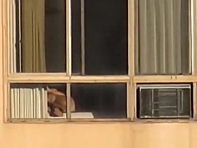 Naked mature woman spied in bedroom bed