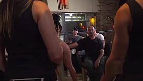 Slave sucks two dicks in public