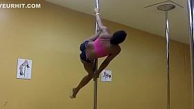 Black babe dances in front of the mirror