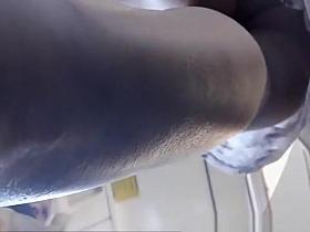 Brunette woman in short dress upskirt