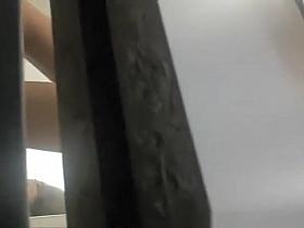 Trying new bikinis in change room