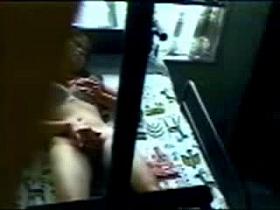 Through window i caught my sister rubbing her pussy