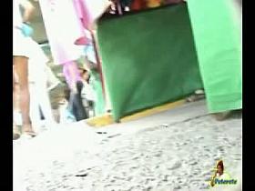 Cuddly chick wears a short white skirt and has a big ass