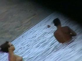 Fat ass big boobed woman is swimming at the summer beach