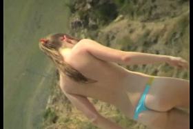 Spy beach cams film hot nudist girls playing in the water