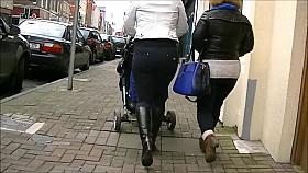 Candid milf in tight black jeans and boots