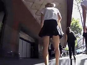 Teen in short dark blue skirt upskirt