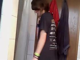 Punk girl voyeured in the bathroom