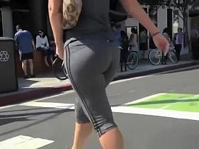Big ass woman in tight gray sports shorts