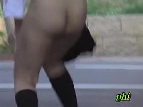 Asian businesswoman gets very surprised when some guy grabs her outfit