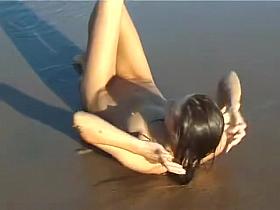 Spy nude girl picked up by voyeur cam at nude beach