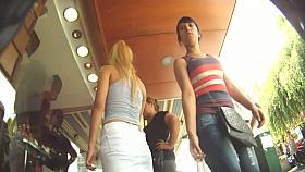 Chubby girl in a flowery skirt gets filmed from below