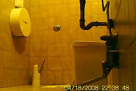 Cute girl with bubble booty is pissing in the toilet