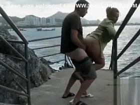 Pounding her love hole by the sea