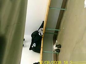 Locker room cam captures her shaved pussy