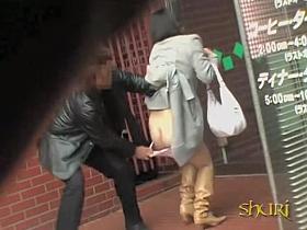 Cute oriental girl getting truly surprised during instant sharking encounter