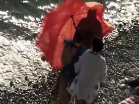 Pussy licking on a beach