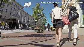 Summer breeze lifts milf's skirt