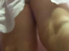 Curvy MILF lets a voyeur get up her skirt