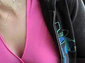 Woman flashes tit and eats sandwich