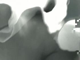 Black and white upskirt video of a girl in net stockings