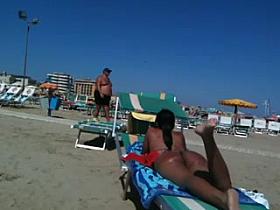 Perfect round latin ass on the beach