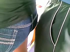 Pervert rubs his erection on a bus girl