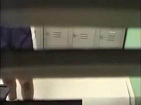 Large Breasted Woman Gets Nude in the Lockerroom