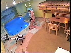 Couple pairing off in pool