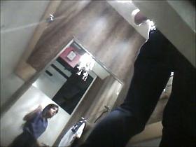 Changing room spy video with brunette in erotic bra