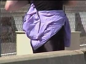 Candid amateur babe is stretching her spandex pants legs 01zn