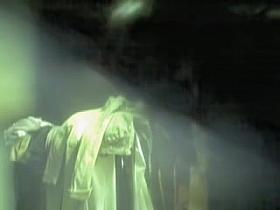 Girl in blue scarf bares off the hot top of her body