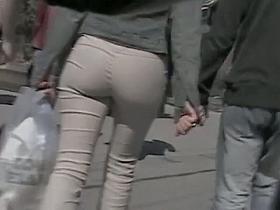 Nice street voyeur shot of tight beige pants on a sexy ass
