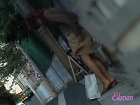 Brown-haired pretty slapper walking down the street during quick sharking