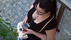 Looking to the neckline of a very busty woman