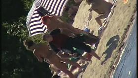 Hot naked red hair chick on nude beach spy camera