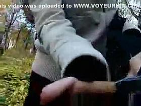 Groper jerking off in front of a walking woman