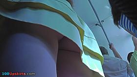 Auburn babe wears mini skirt in upskirt movie