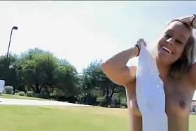 Topless girl in park